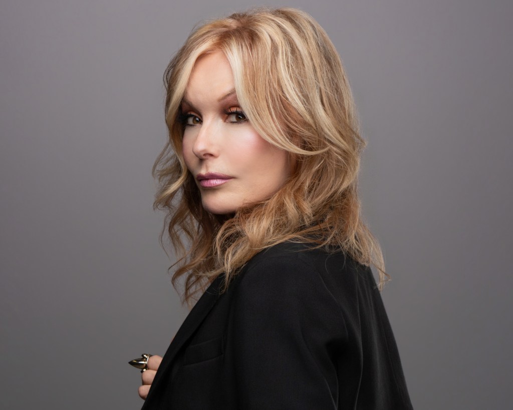 Tracey E. Bregman as Lauren on Y&R