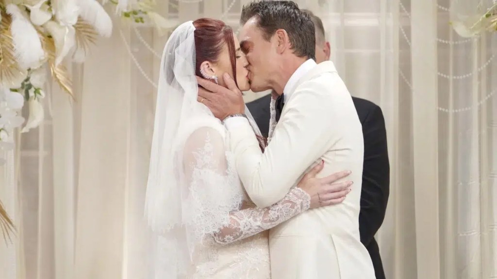 billy and sally kiss at the wedding on young and the restless